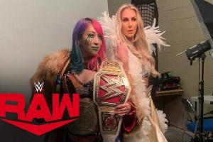 Charlotte Flair & Asuka Pose As WWE Women’s Tag Team Champions