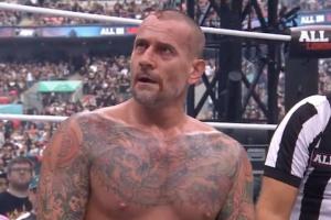 Security Escorts CM Punk Back To His Dressing Room Following His AEW All In Match