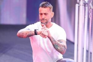 Report: Seth Rollins Had To Be Ushered Away By Triple H And Michael Cole As He Was Not Happy About CM Punk's Appearance