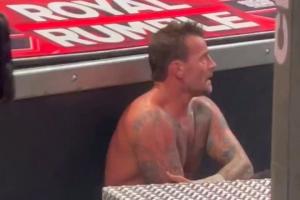 Footage Of CM Punk Sporting A Dejected Look On His Face After Getting Eliminated