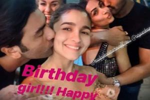 Ranbir giving a peck on Alia's cheek, picture goes viral